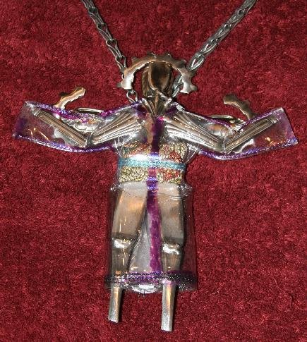 Steel Art Figure In Clear Plastic Raincoat