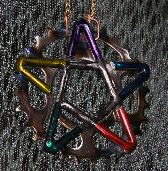 Necklace with steel pentacle on bicycle gear
