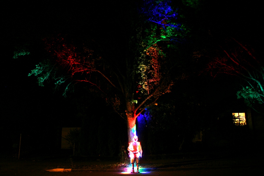 Beauty Projected From A Lighted Rain Bonnet To Trees